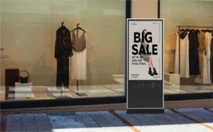 A Digital Signage Kiosk being displayed outside a store promoting a sale.