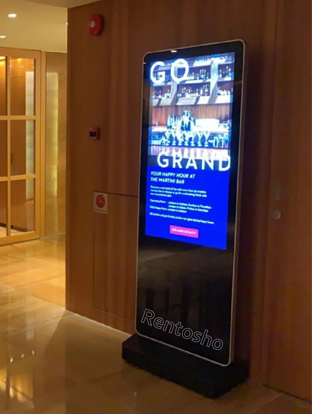 Interactive digital signage kiosk showcasing hotel amenities, dining options, events, and local attractions at the Grand Hyatt Singapore.
